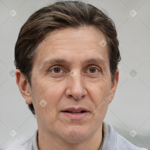 Joyful white adult male with short  brown hair and grey eyes