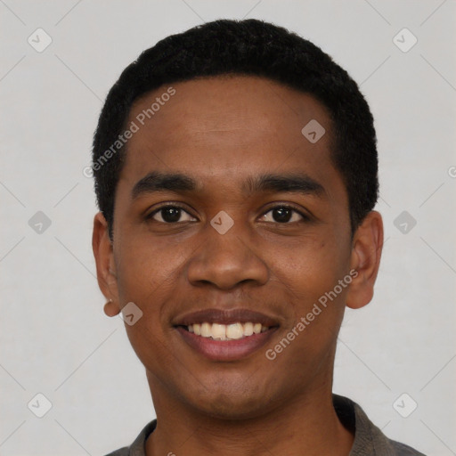 Joyful black young-adult male with short  black hair and brown eyes