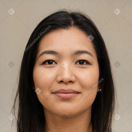 Joyful latino young-adult female with long  brown hair and brown eyes