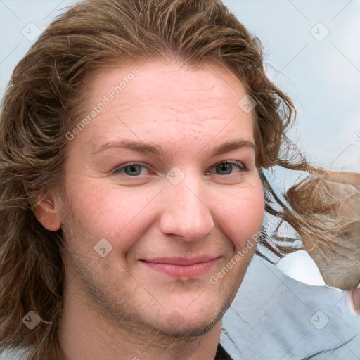 Joyful white young-adult female with long  brown hair and blue eyes