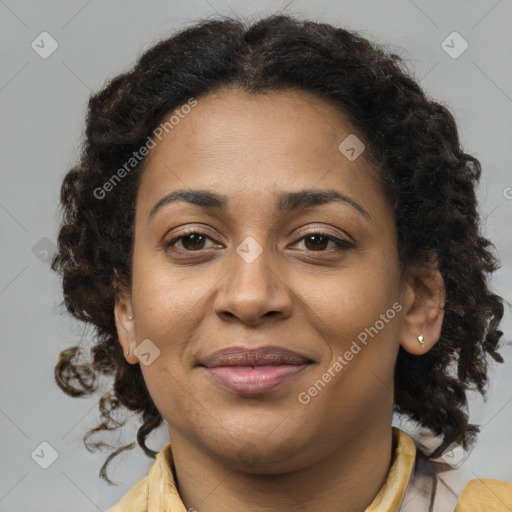 Joyful black young-adult female with medium  brown hair and brown eyes