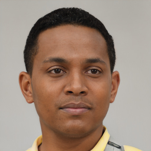 Neutral black young-adult male with short  brown hair and brown eyes