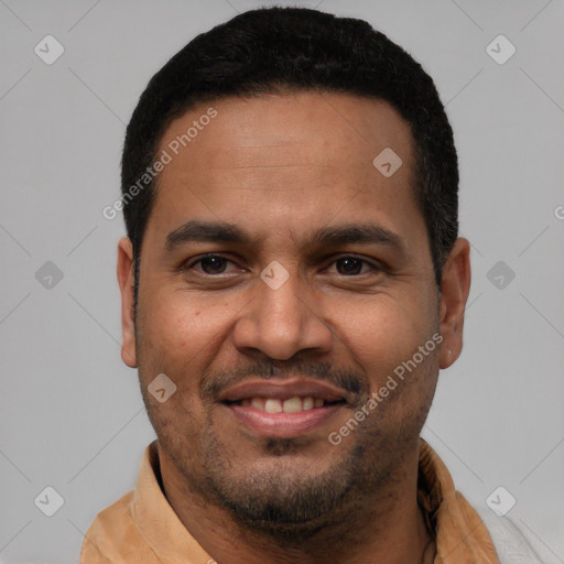 Joyful latino adult male with short  black hair and brown eyes