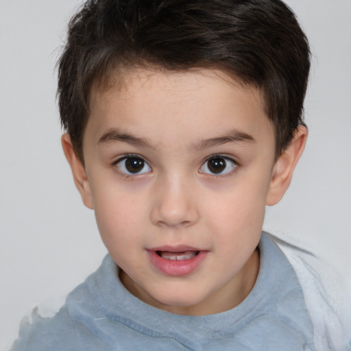 Joyful white child female with short  brown hair and brown eyes