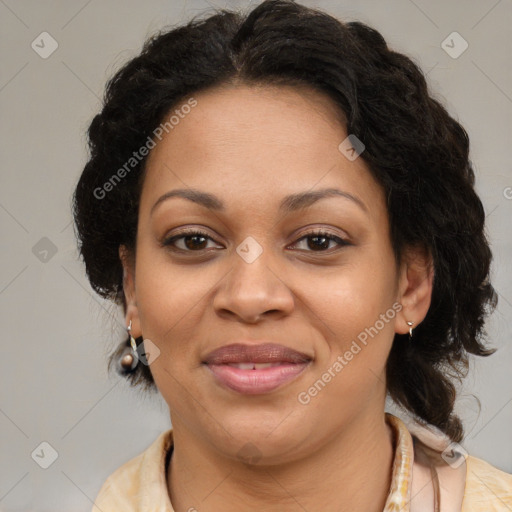 Joyful latino adult female with medium  brown hair and brown eyes