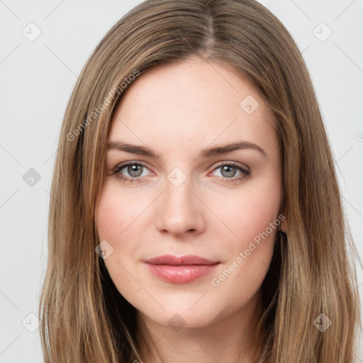 Joyful white young-adult female with long  brown hair and green eyes