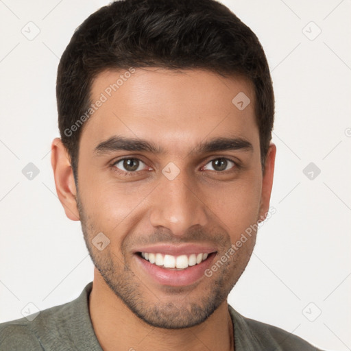 Joyful white young-adult male with short  brown hair and brown eyes