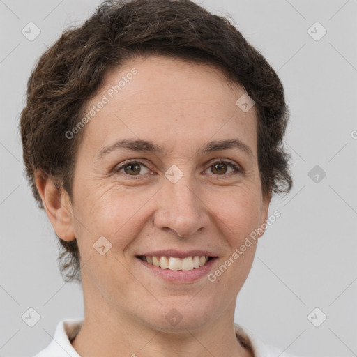 Joyful white adult female with short  brown hair and brown eyes