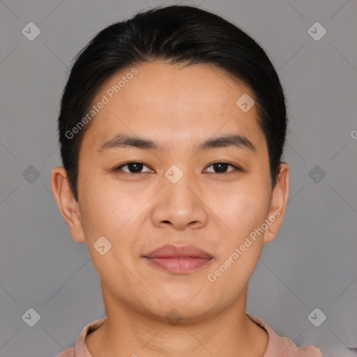 Joyful asian young-adult male with short  black hair and brown eyes