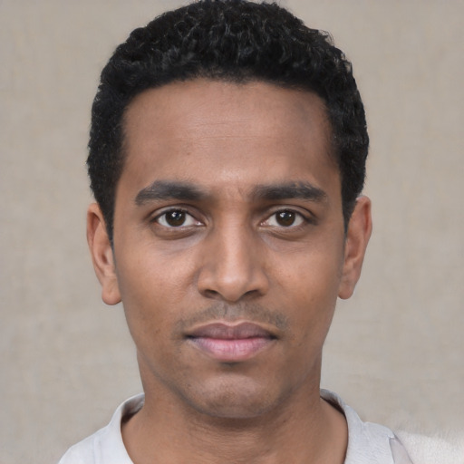 Neutral black young-adult male with short  black hair and brown eyes