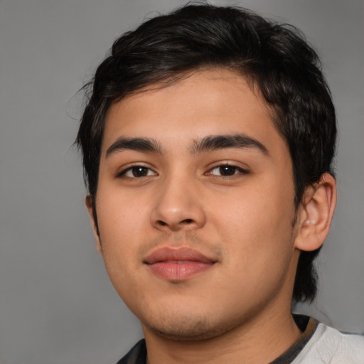 Neutral latino young-adult male with short  brown hair and brown eyes