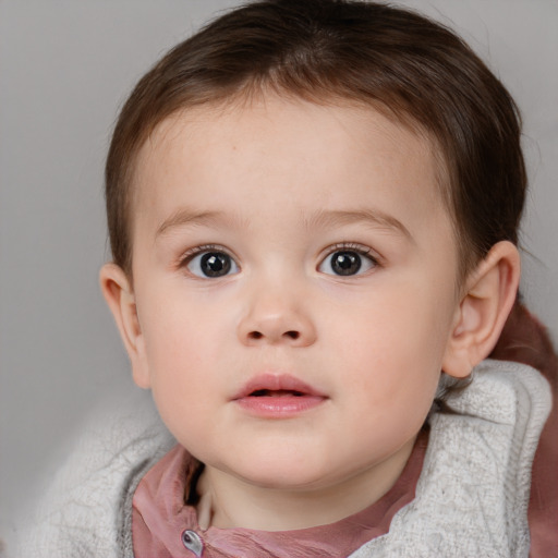 Neutral white child female with short  brown hair and brown eyes