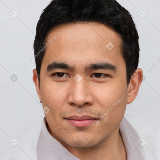 Joyful latino young-adult male with short  black hair and brown eyes