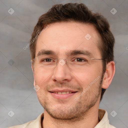 Joyful white adult male with short  brown hair and brown eyes