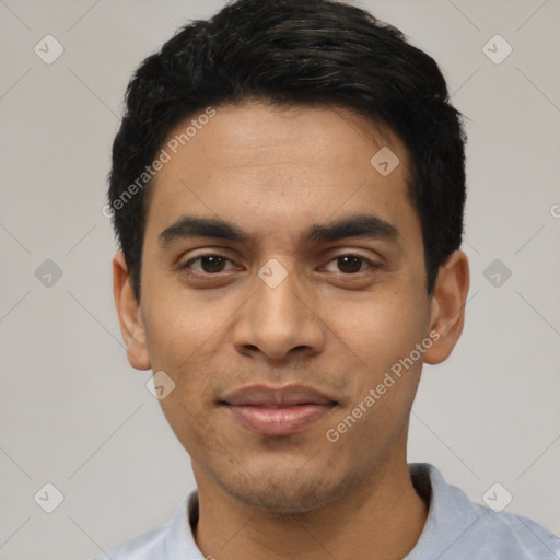 Joyful asian young-adult male with short  black hair and brown eyes