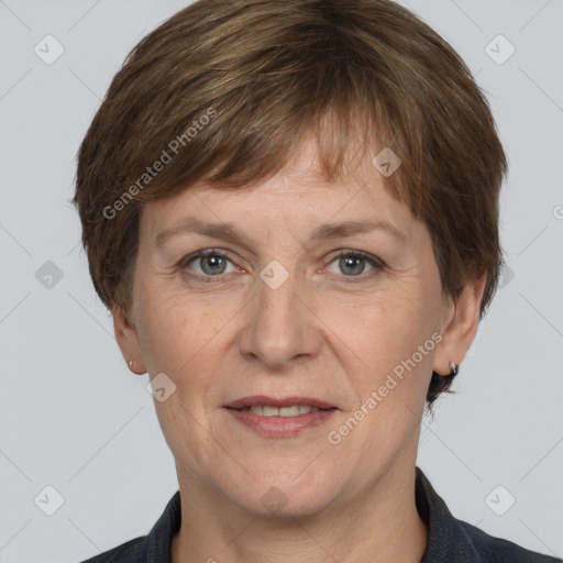 Joyful white adult female with medium  brown hair and brown eyes