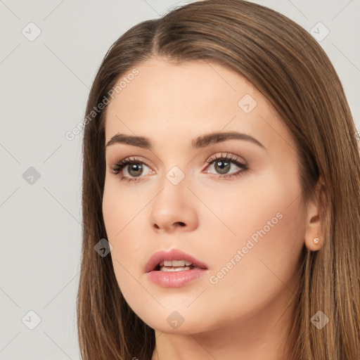 Neutral white young-adult female with long  brown hair and brown eyes