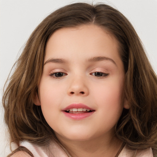 Joyful white child female with long  brown hair and brown eyes