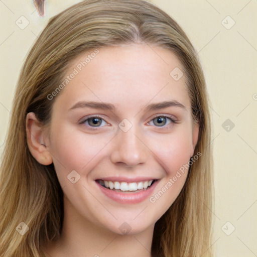 Joyful white young-adult female with long  brown hair and grey eyes