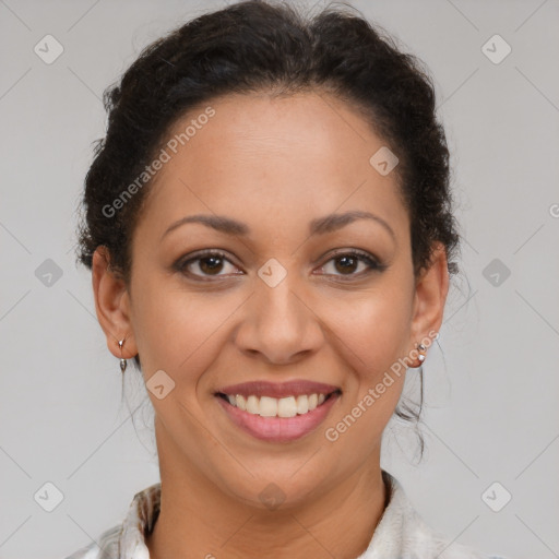 Joyful latino young-adult female with short  brown hair and brown eyes