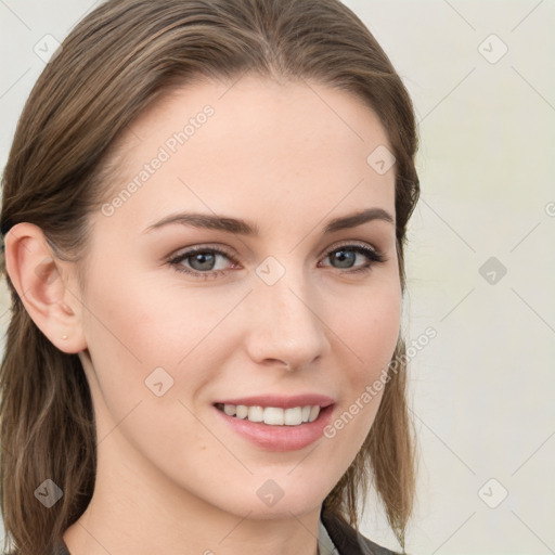 Joyful white young-adult female with long  brown hair and blue eyes