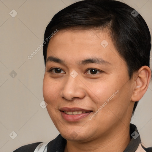 Joyful white adult male with short  brown hair and brown eyes