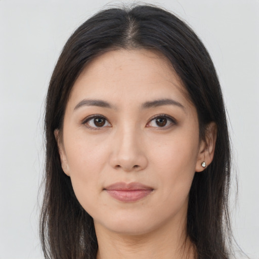 Neutral asian young-adult female with long  brown hair and brown eyes