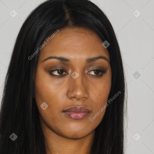 Joyful asian young-adult female with long  brown hair and brown eyes