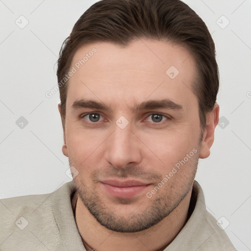 Joyful white young-adult male with short  brown hair and brown eyes