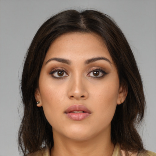 Neutral asian young-adult female with long  brown hair and brown eyes