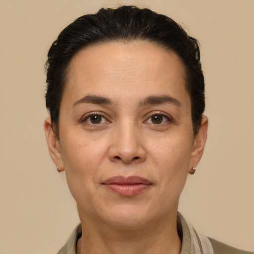 Joyful white adult female with short  brown hair and brown eyes