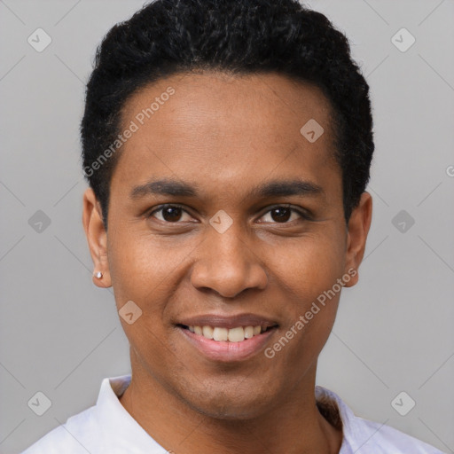 Joyful black young-adult male with short  black hair and brown eyes