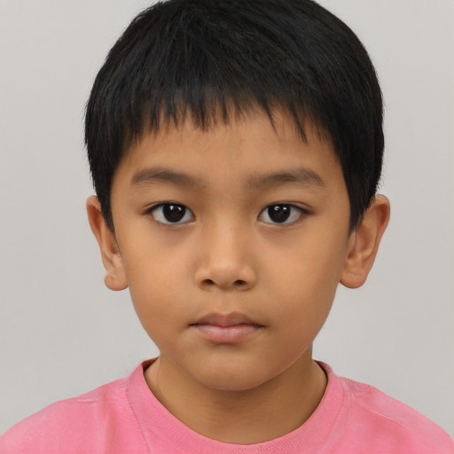 Neutral asian child male with short  brown hair and brown eyes