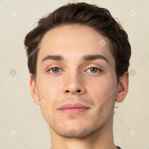 Neutral white young-adult male with short  brown hair and grey eyes