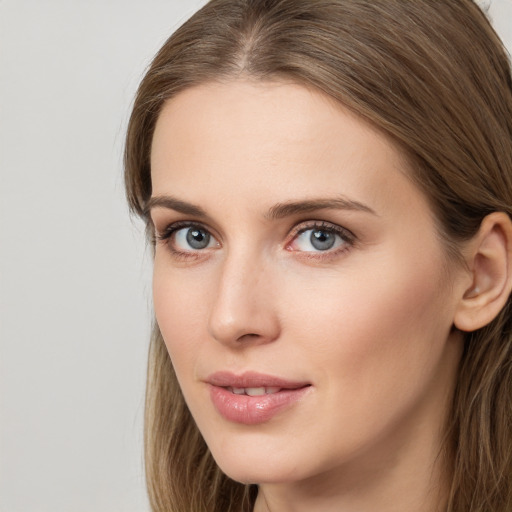 Neutral white young-adult female with long  brown hair and grey eyes