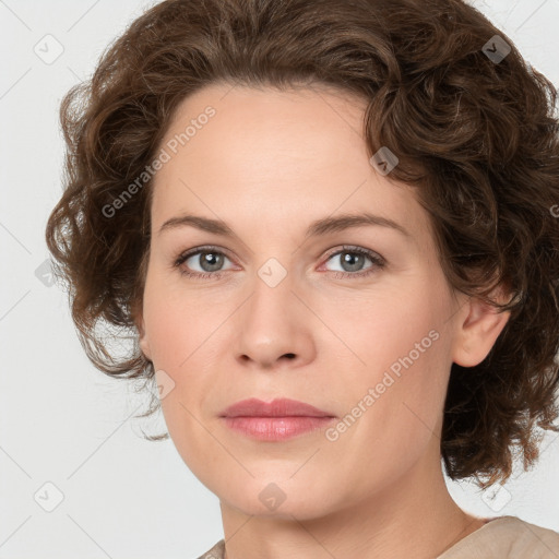 Joyful white young-adult female with medium  brown hair and green eyes