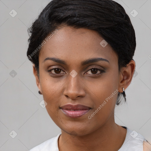 Joyful asian young-adult female with short  black hair and brown eyes