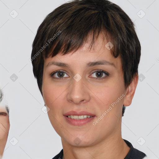 Joyful white young-adult female with short  brown hair and brown eyes