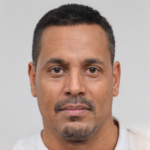 Neutral white adult male with short  black hair and brown eyes