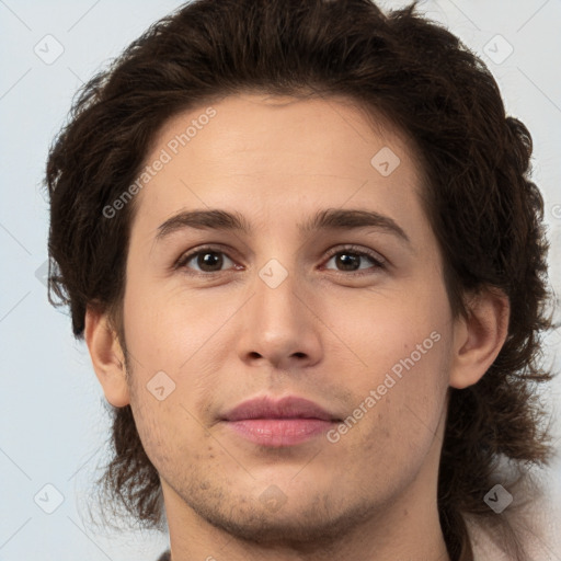 Joyful white young-adult male with medium  brown hair and brown eyes