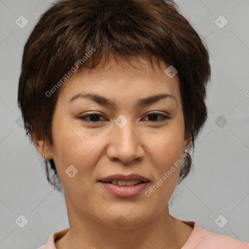 Joyful asian adult female with medium  brown hair and brown eyes