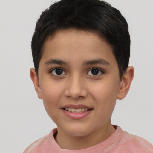 Joyful asian child female with short  brown hair and brown eyes