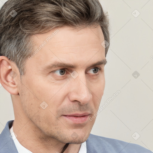 Neutral white adult male with short  brown hair and brown eyes