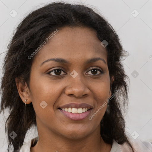 Joyful black young-adult female with medium  brown hair and brown eyes