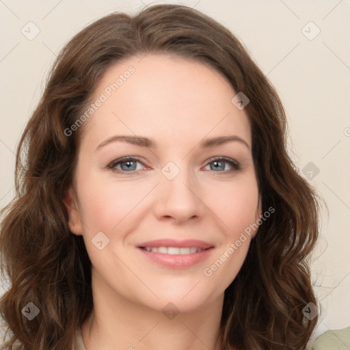 Joyful white young-adult female with long  brown hair and green eyes