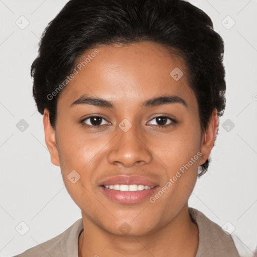 Joyful latino young-adult female with short  brown hair and brown eyes