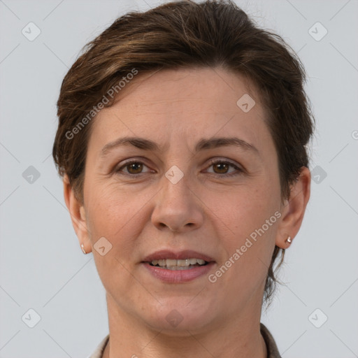 Joyful white adult female with short  brown hair and brown eyes