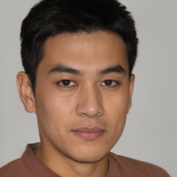 Neutral asian young-adult male with short  brown hair and brown eyes