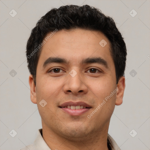 Joyful latino young-adult male with short  brown hair and brown eyes