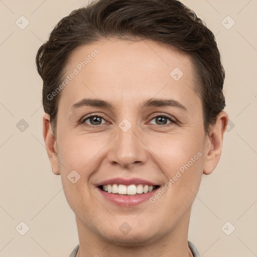 Joyful white young-adult female with short  brown hair and brown eyes